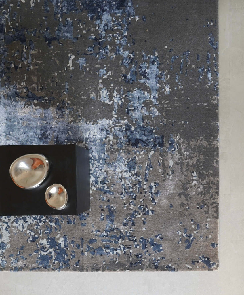 A U R A luxury handmade rug by Cherom in blue and gray New Zealand wool with contemporary design.