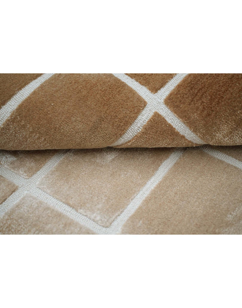 F A D E luxury modern rug by Cherom - a stunning blend of beige and brown tones.