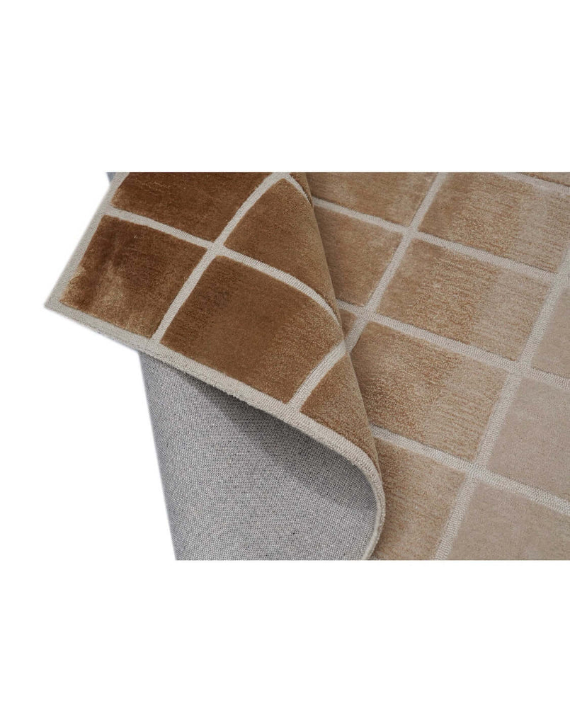 F A D E luxury modern rug by Cherom, showcasing a soft ombré pattern in beige and brown. Perfect for contemporary spaces.