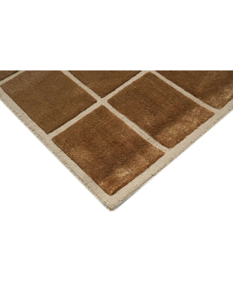 F A D E luxury modern rug by Cherom, showcasing a stunning ombré effect in warm brown and beige tones. Perfect for contemporary spaces.