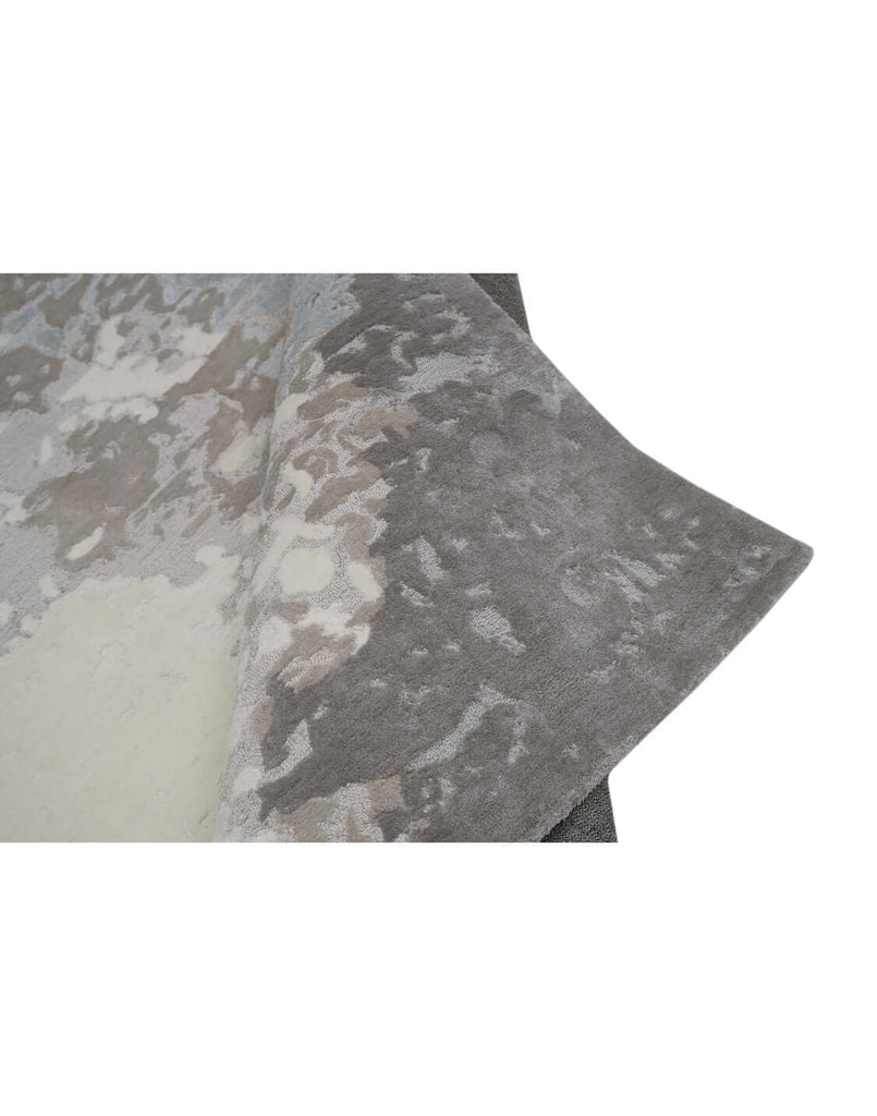 F R O S T luxury modern rug by Cherom, a contemporary rug in grey tones, perfect for modern decor.