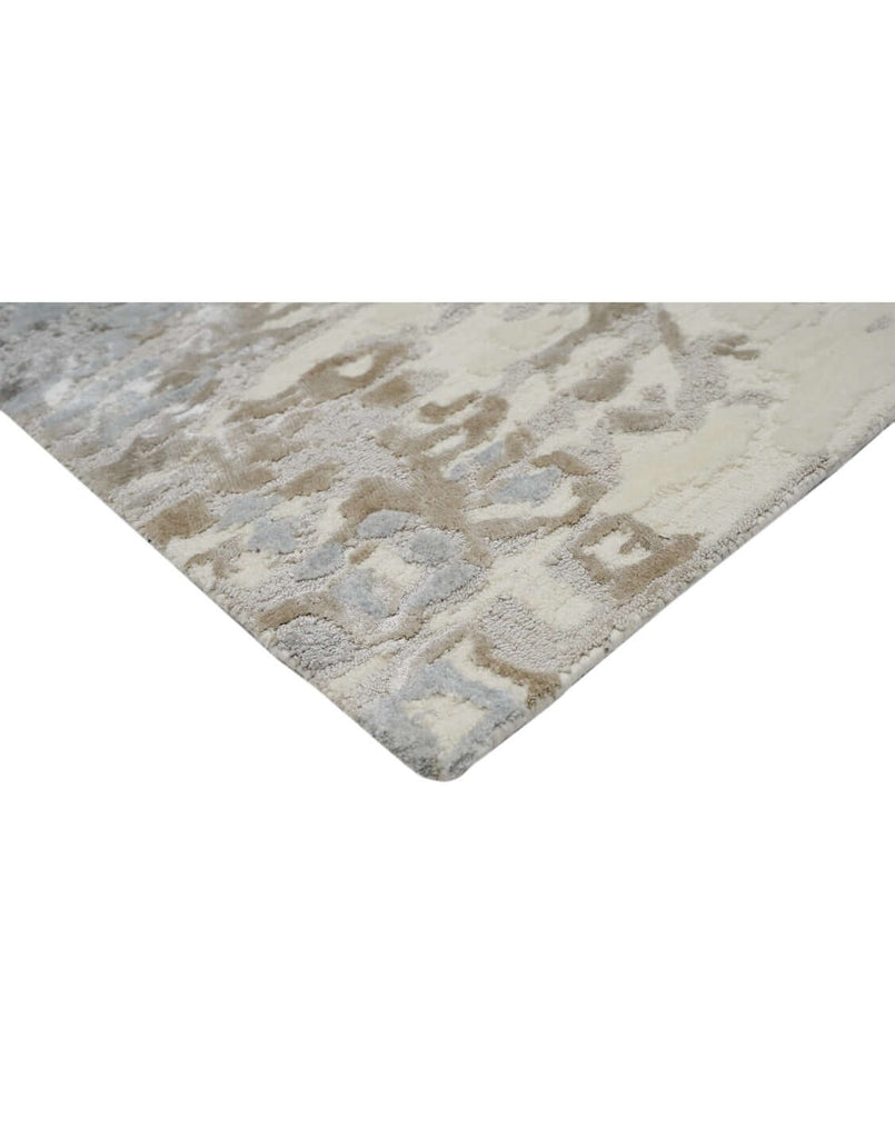 F R O S T luxury modern rug by Cherom, a contemporary rug in charcoal, silver-grey, taupe, and ivory.
