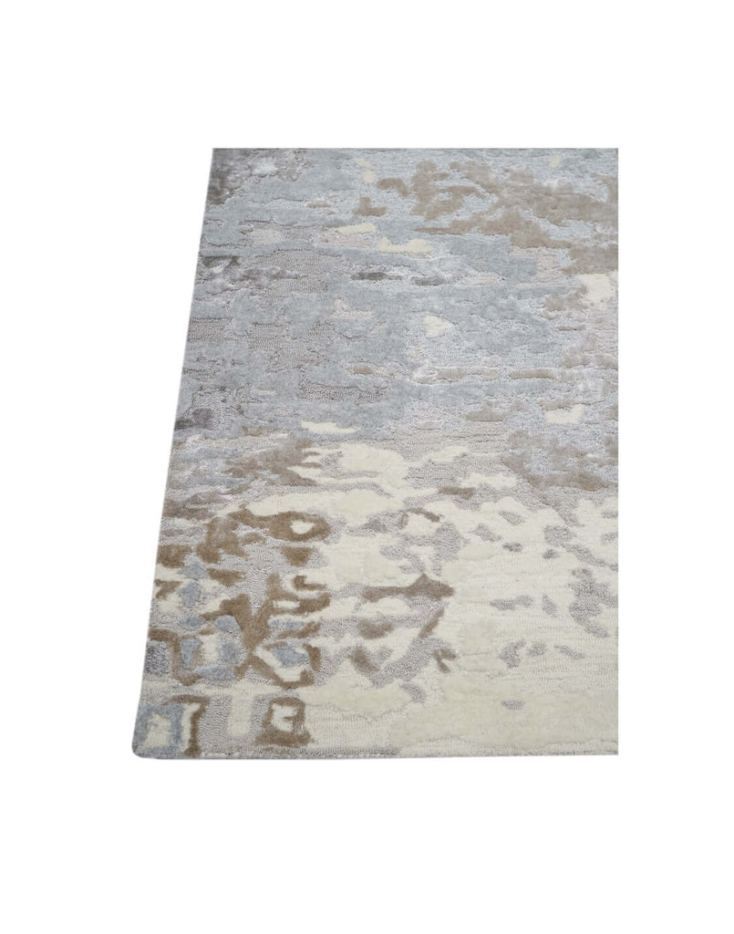 F R O S T luxury modern rug by Cherom, a contemporary rug featuring grey and ivory tones.