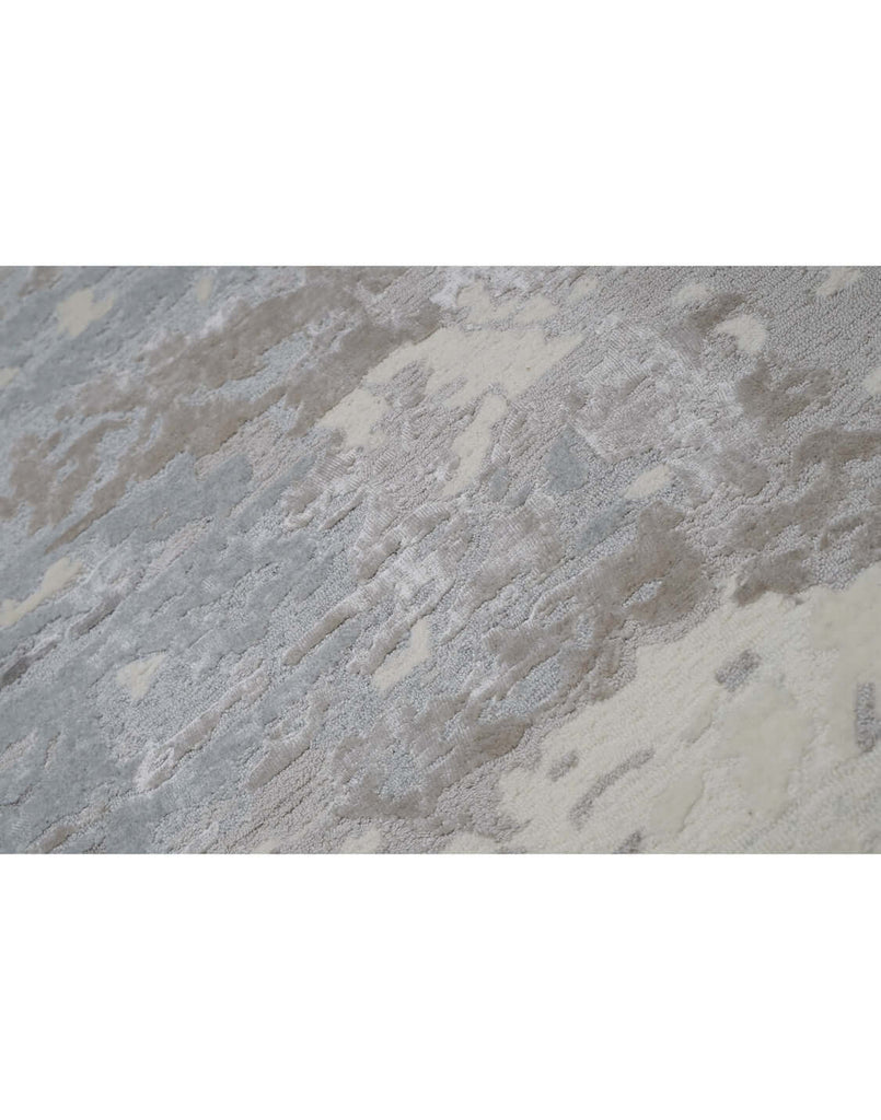 F R O S T luxury modern rug by Cherom, a contemporary rug with shades of grey in a serene design.