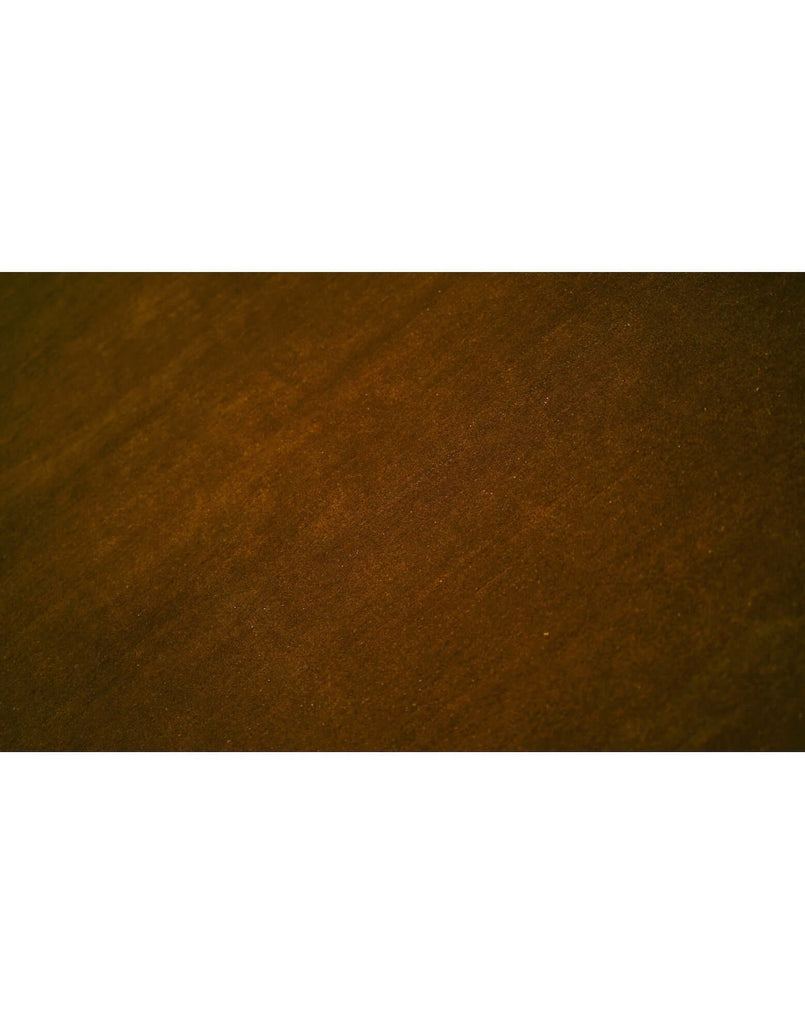 Close-up of the I C O N - A M B E R rug showcasing its rich texture and high-quality New Zealand wool craftsmanship.