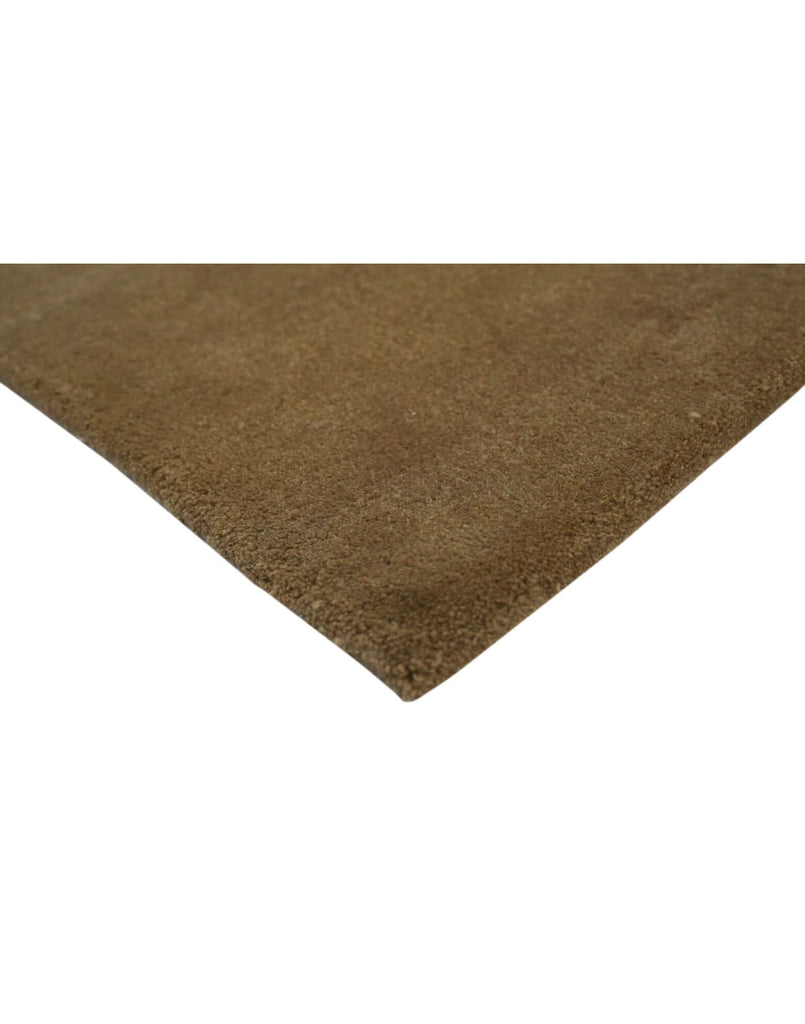 I C O N - C A R A M E L luxury handmade rug by Cherom in rich brown New Zealand wool.