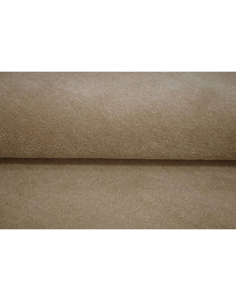 I C O N - L A T T E rug made from high-quality New Zealand wool, showcasing its soft texture and craftsmanship.