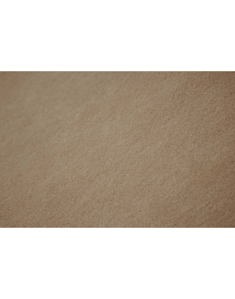 I C O N - L A T T E rug surface detail showcasing its fine New Zealand wool craftsmanship and soft texture.