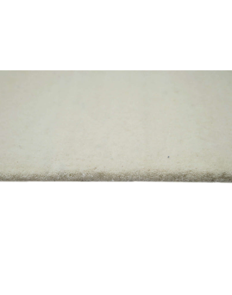 I C O N - M I L K rug detail showcasing high-density tufting in premium New Zealand wool.