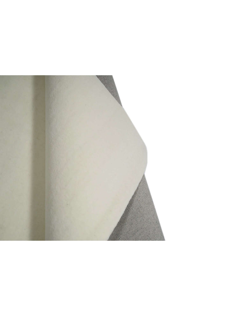 I C O N - M I L K rug showing the high quality New Zealand wool and dense tufting craftsmanship.