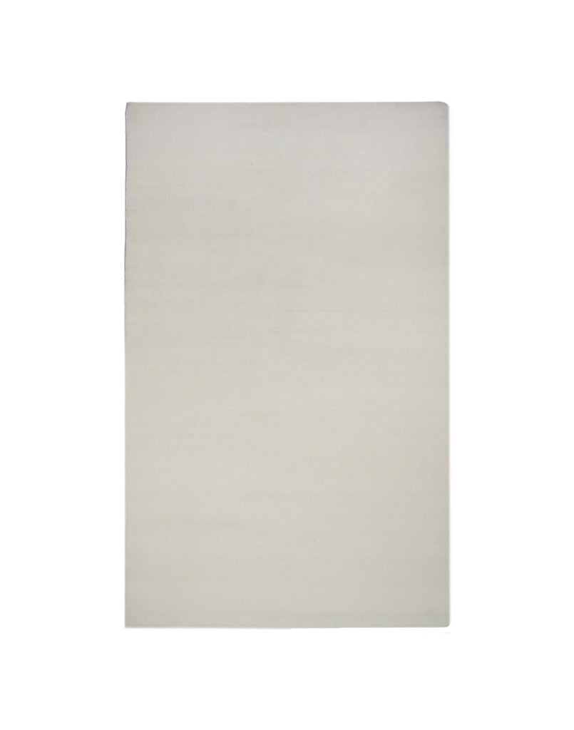 I C O N - M I L K hand-tufted rug in soft cream color, crafted from 100% New Zealand wool, featuring durable high density tufting.