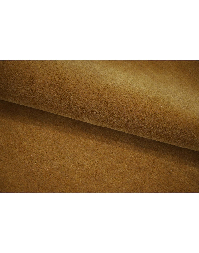 I C O N - O C H R E high-quality New Zealand wool rug, featuring a rich ochre color and superior craftsmanship.