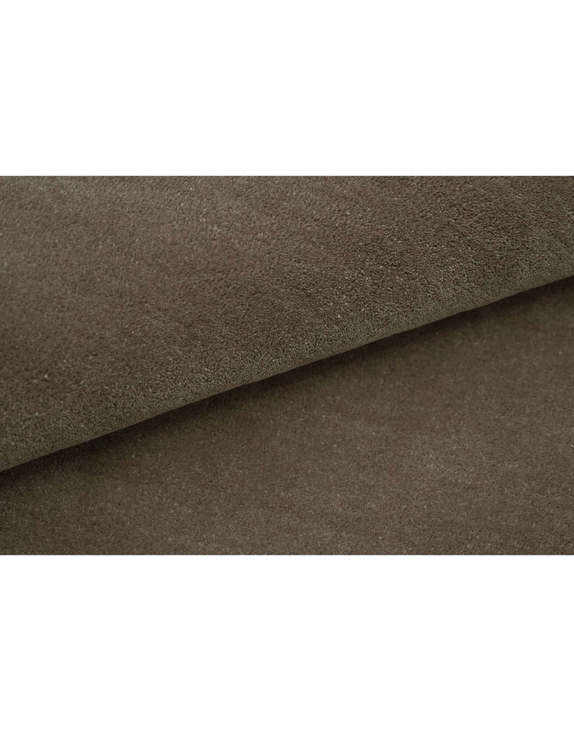 Texture detail of I C O N - T R U F F L E rug showcasing the premium New Zealand wool in rich brown color.