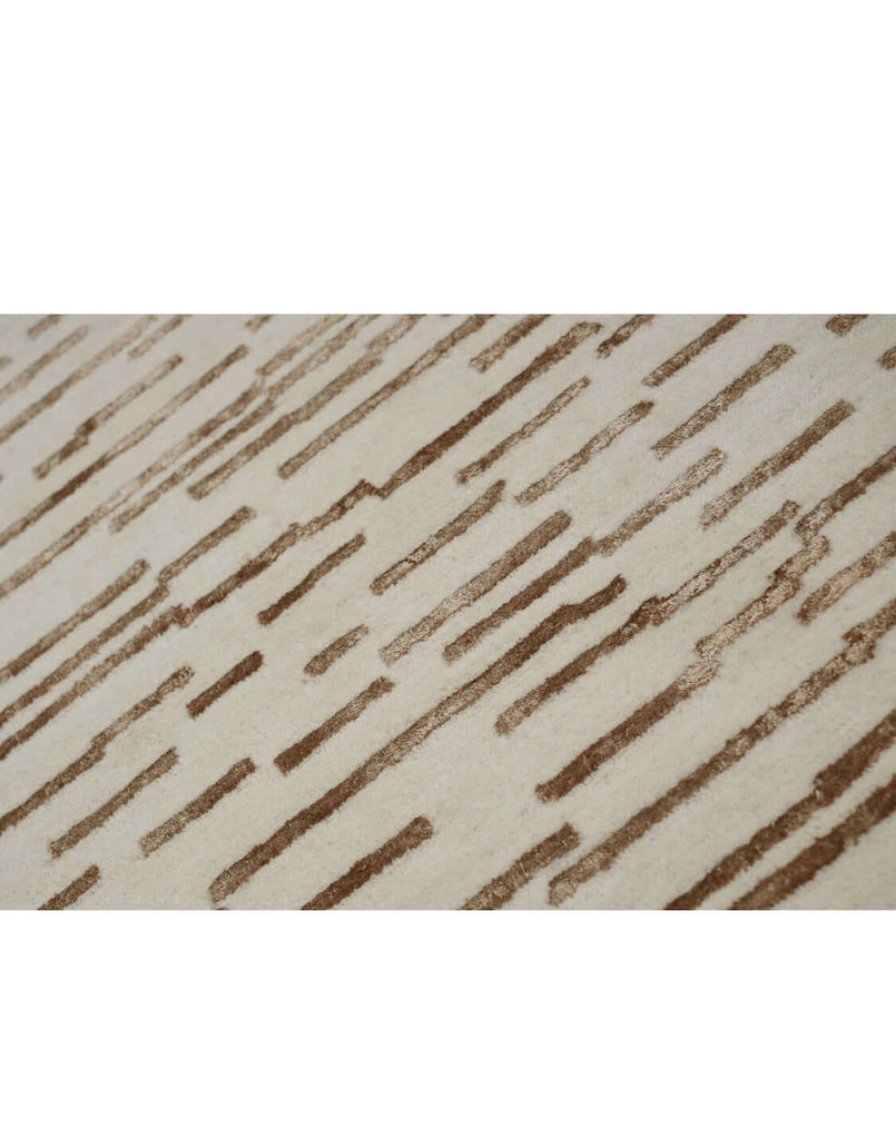 D A S H luxury modern rug by Cherom with horizontal lines in warm brown on a beige background.