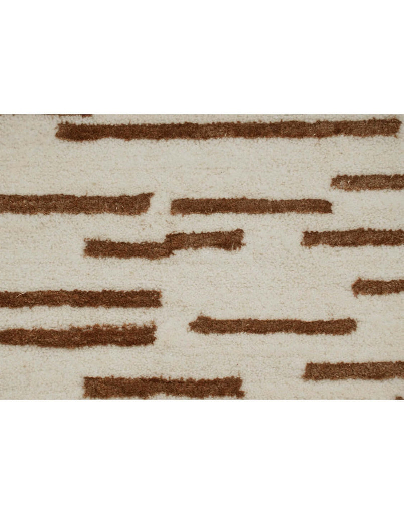 D A S H luxury modern rug by Cherom, featuring horizontal lines in warm brown on a beige background.