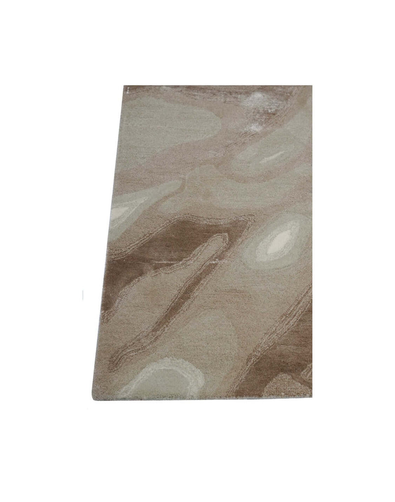 S A H A R A luxury modern rug by Cherom in soft beige and taupe, featuring organic patterns for contemporary interiors.