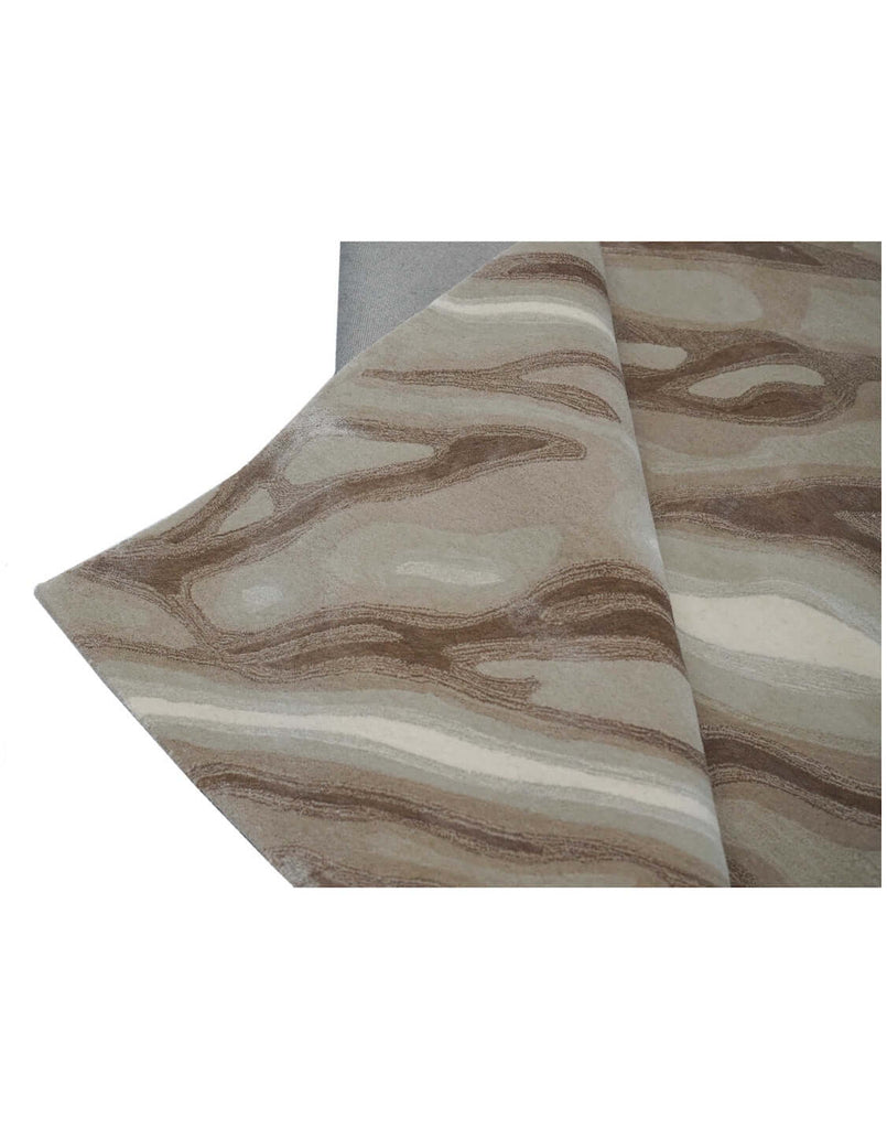 S A H A R A luxury modern rug by Cherom showcasing soft beige and taupe organic patterns.