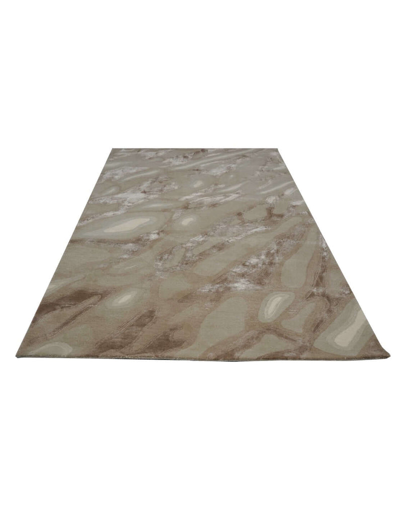 S A H A R A luxury modern rug by Cherom in warm beige and taupe, showcasing fluid organic patterns.