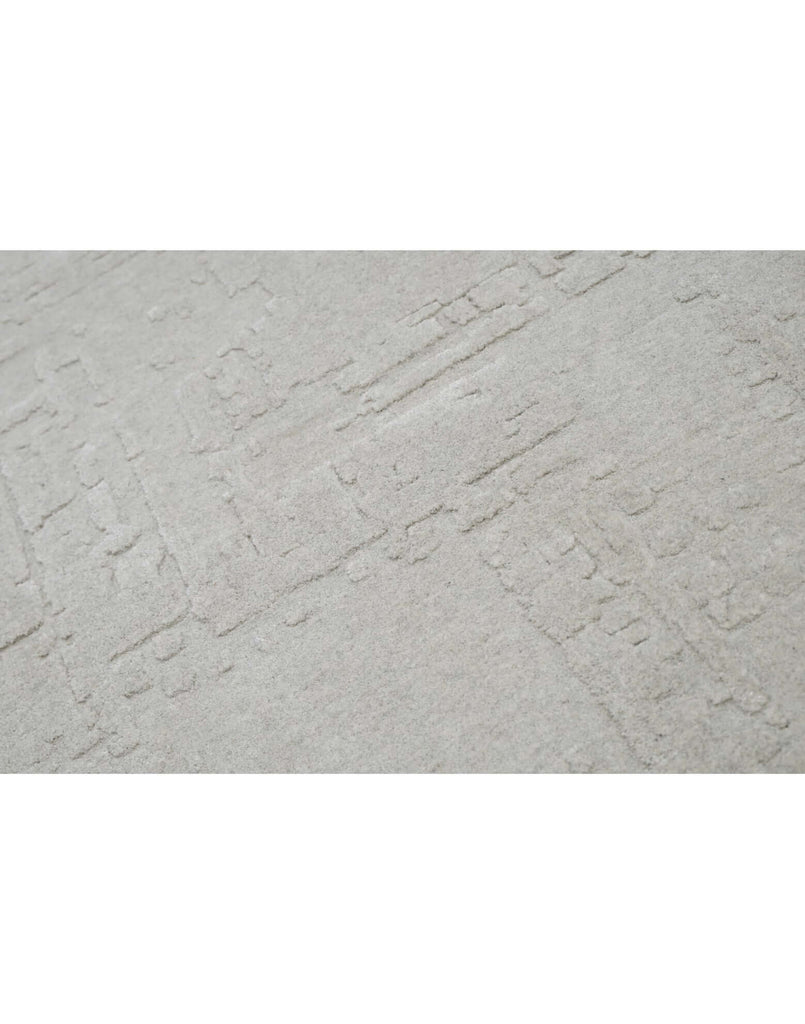 S C U L P T E D - U R B A N A luxury modern rug by Cherom, showcasing soft grey tone and delicate texture.