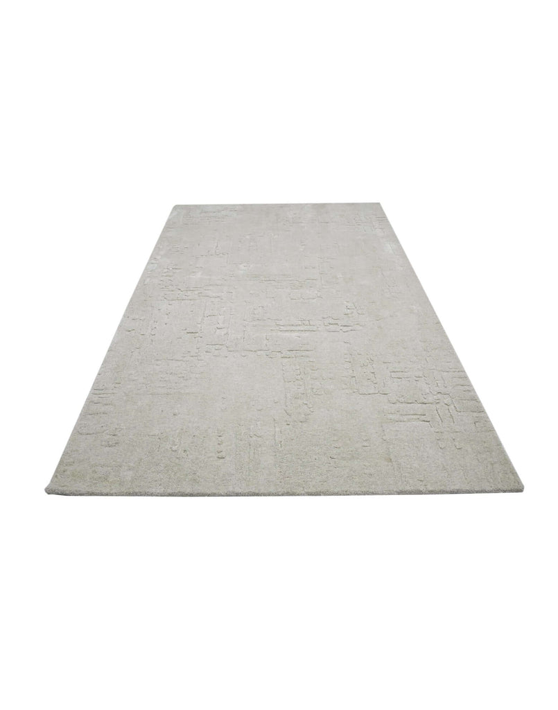 S C U L P T E D - U R B A N A luxury modern rug by Cherom, a soft grey hand-tufted contemporary rug.