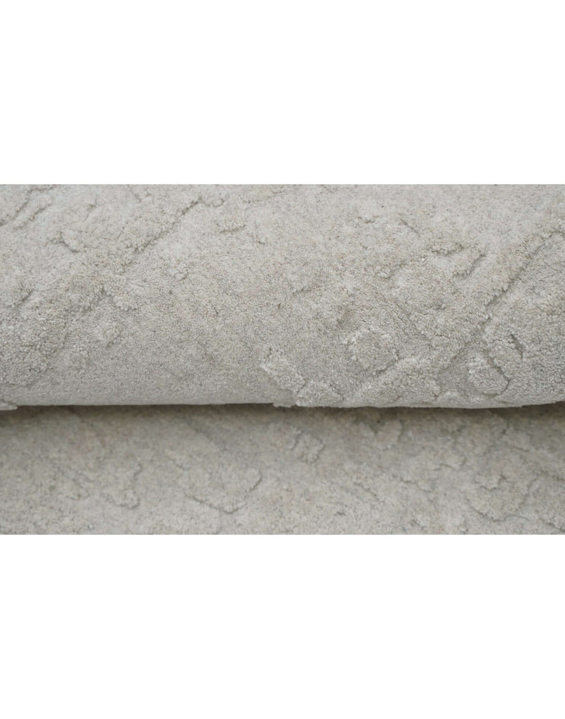 S C U L P T E D - U R B A N A luxury modern rug by Cherom - soft grey with textured detail, ideal for contemporary interiors.