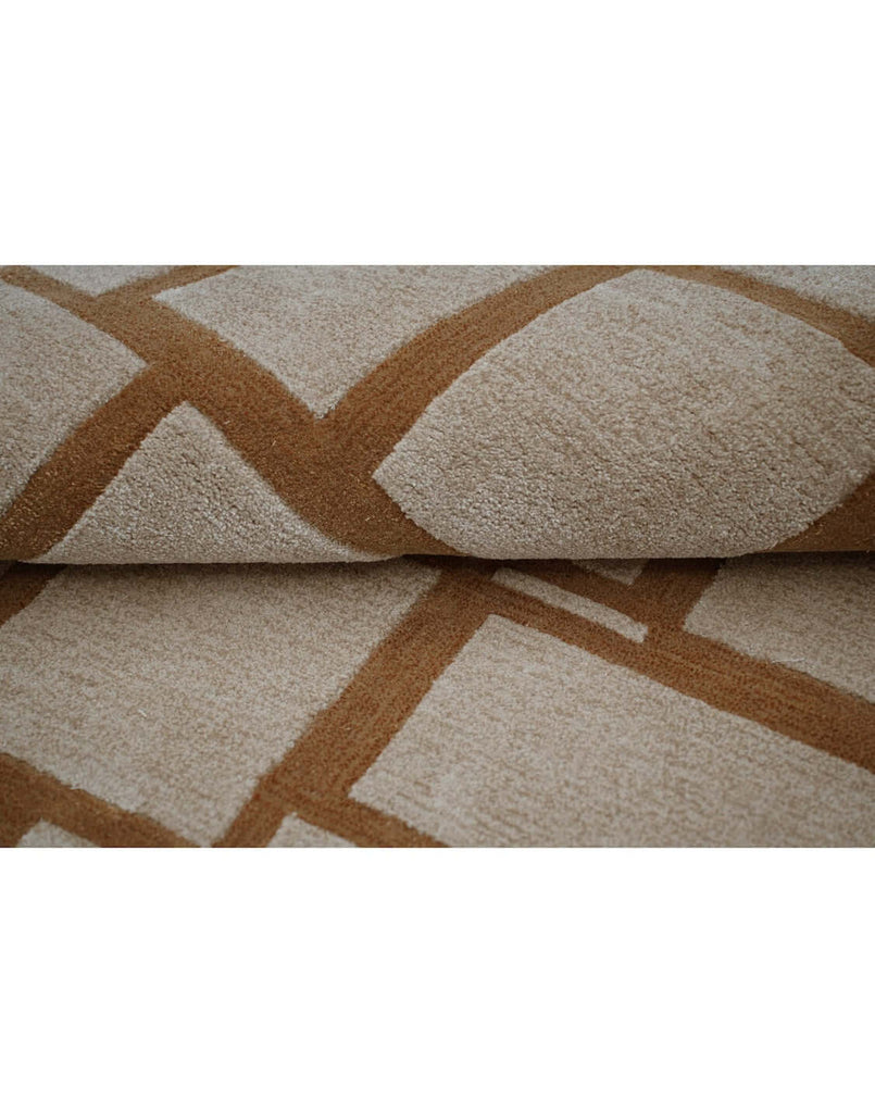 S T O N E W O R K luxury modern rug by Cherom, featuring classic masonry patterns in beige and rust.
